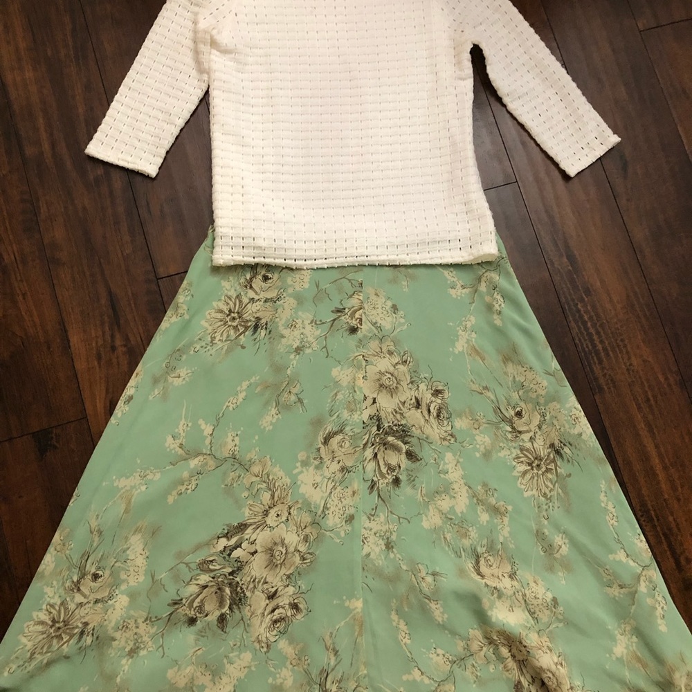 White blouse, lined with eyelet cutouts